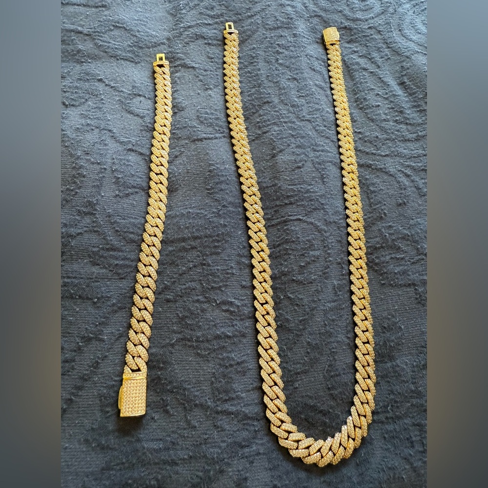• 10mm - 22”Iced Prong Cuban Gold Chain 
• 10mm - 8” Gold Iced Cuban Bracelet